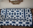 I am experimenting with my own layout design here. Army Star, Is the block used.I used the quilt-as-you-go-approach. I started in the center and worked rounds out.