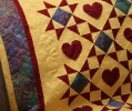 Lots of stipple quilting on this one...helped the hearts pop out