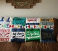 I used a row of multi-fabric quarter squares to join between rows of teams with plain white strips on the back side.